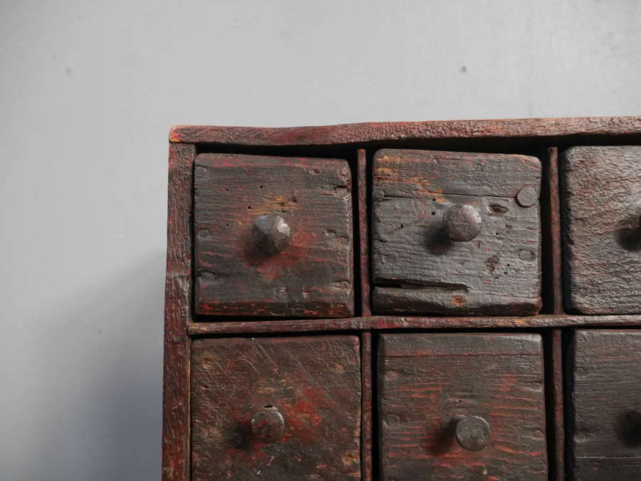 Small Primitive Bank of Drawers